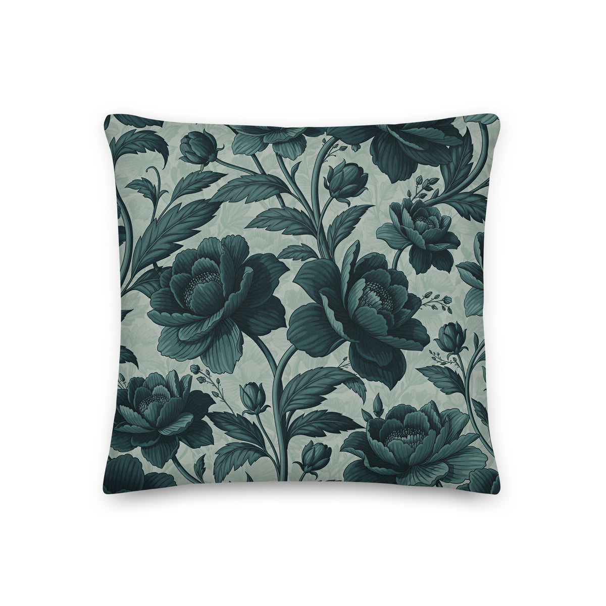A beautifully detailed botanical pattern in sophisticated shades of deep teal and soft sage, this cushion brings classic charm and refined style