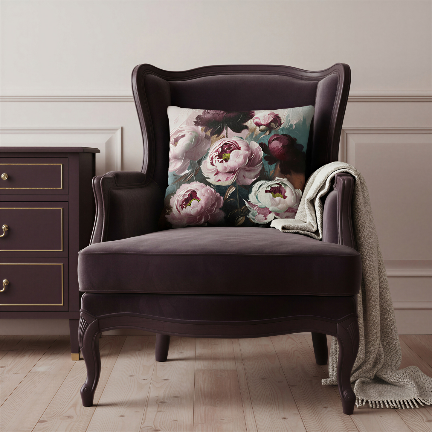 Square decorative cushion featuring large powder-pink and ivory peony flowers alongside deep plum noir blooms, with dark foliage and smoky teal-blue background accents.