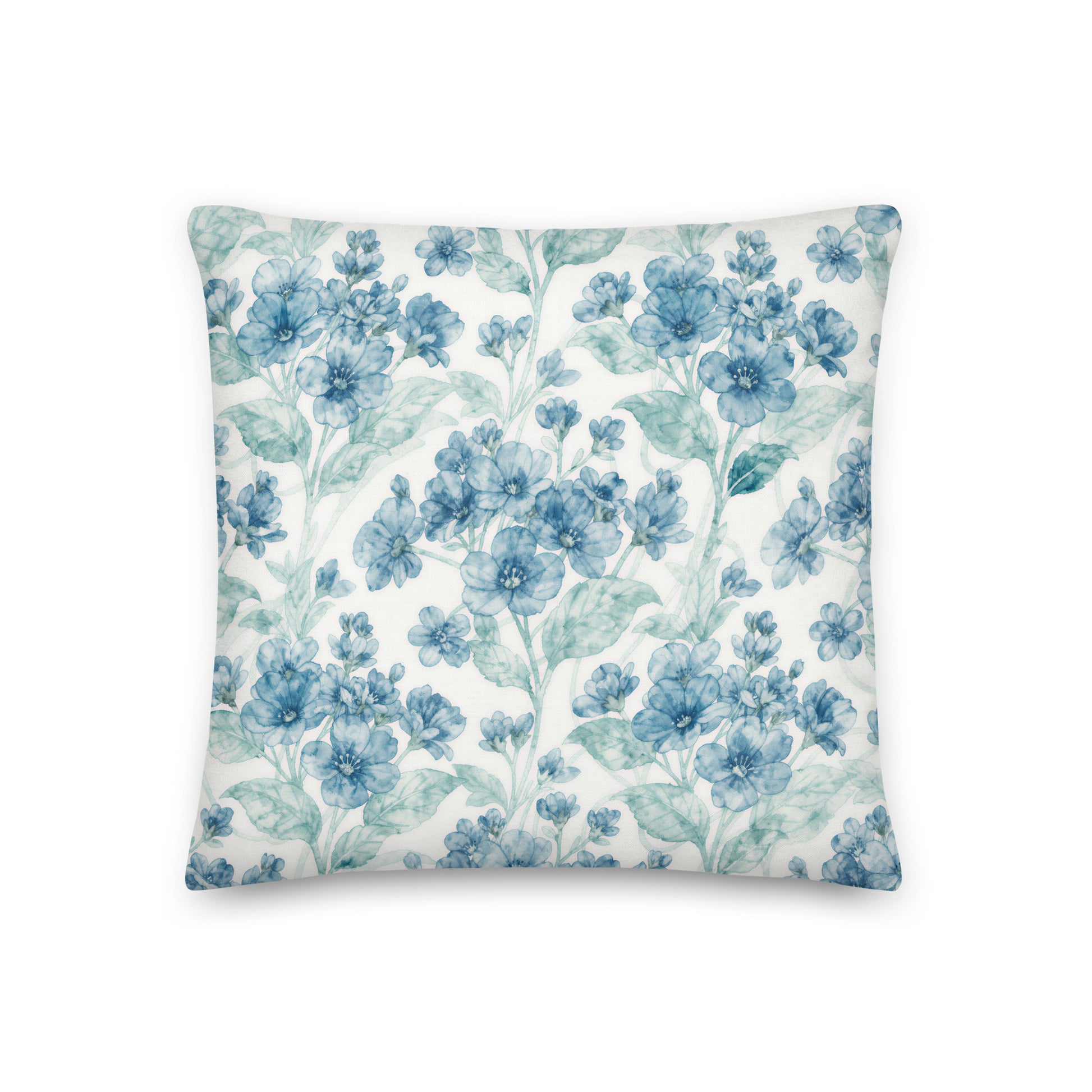 Delicate clusters of blue blossoms, unopened buds and softly painted foliage trail gracefully across a warm ivory background, creating an airy botanical pattern inspired by traditional chintz fabrics.