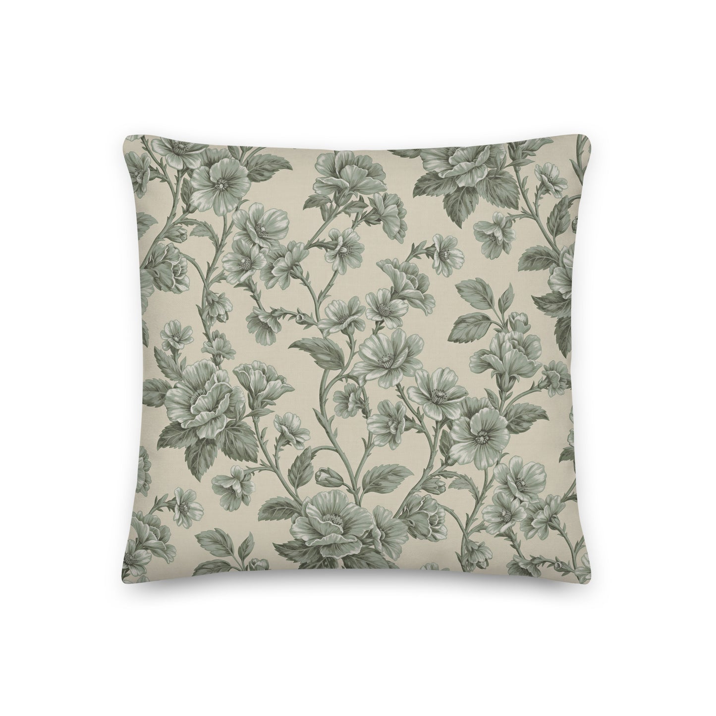 Square scatter cushion featuring an intricate sage green flowers and foliage on a warm cream background.