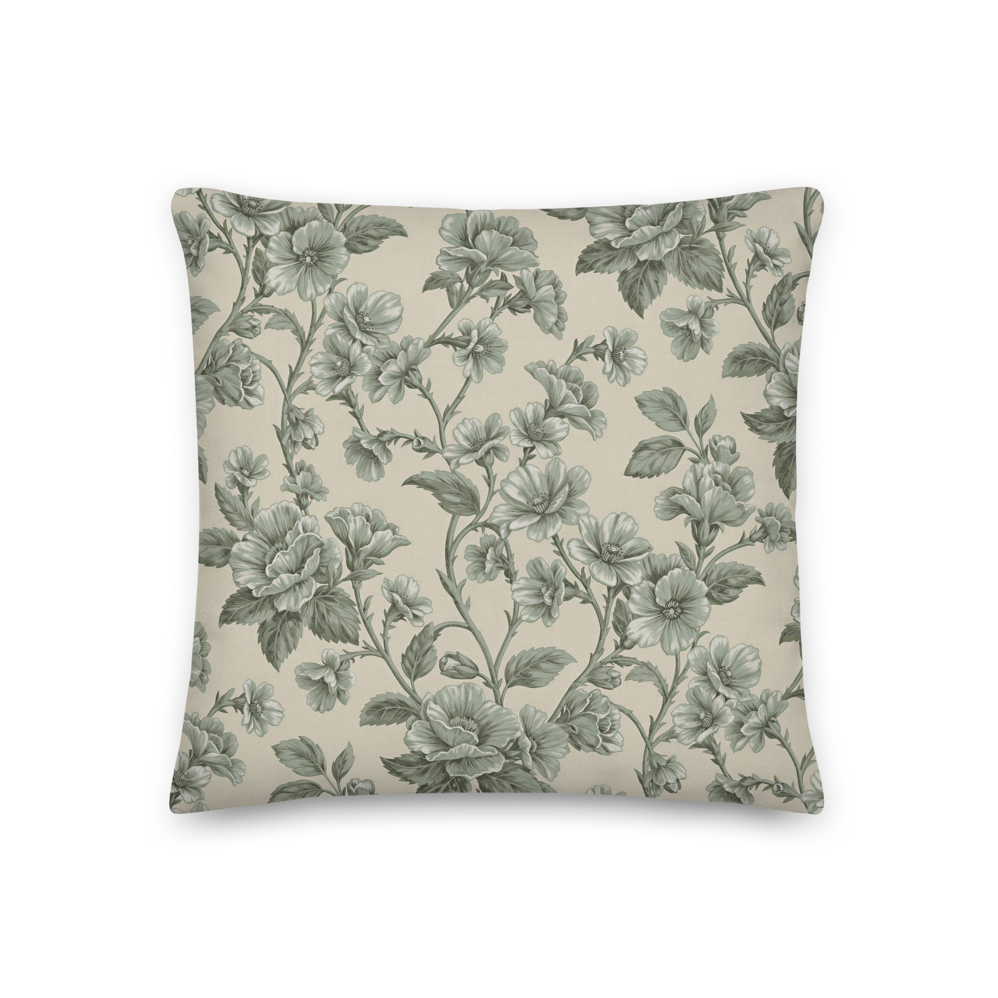Square scatter cushion featuring an intricate sage green flowers and foliage on a warm cream background.