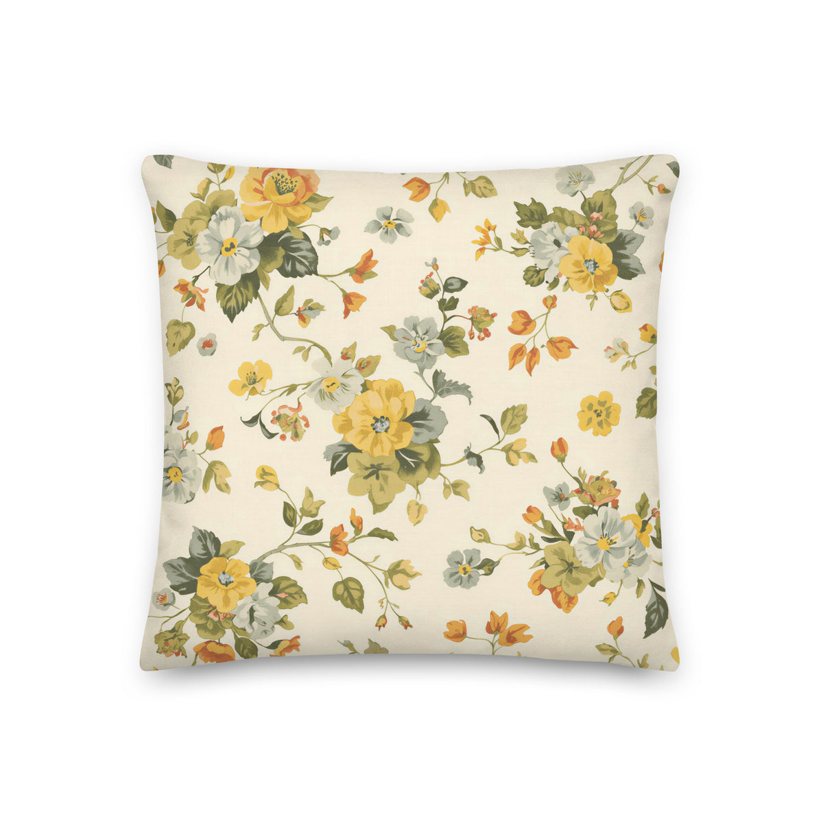 Square cushion displaying delicate botanical flowers and winding stems in muted yellow, cream, blue, green and orange tones. The pattern has a classic English country garden appearance.